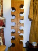 An oak designer wine rack (ex Harrods)