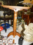 An inlaid light mahogany side table