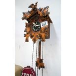 A cuckoo clock (no weights)