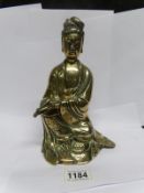 A 19th century Oriental brass Buddha