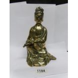 A 19th century Oriental brass Buddha