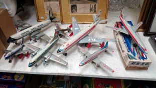 7 good tinplate aircraft