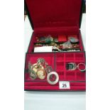 A jewellery box with contents including costume jewellery & silver brooch etc.