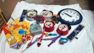 A collection of Disney & other cartoon clocks and watches