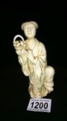 An early hard paste Oriental figure
