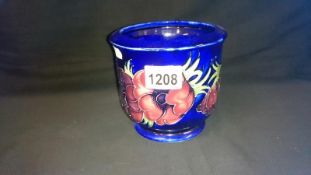 Moorcroft floral bowl with blue background