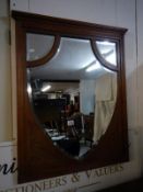 A Victorian mahogany bevelled edge mirror