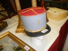 A vintage French Genderme Kepi hat