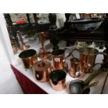 A mixed lot of Victorian and other copper ware including jelly mould, candlestick, coffee pot,