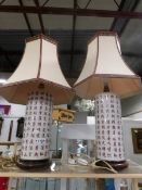 A pair of Oriental style table lamps with shades