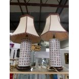 A pair of Oriental style table lamps with shades