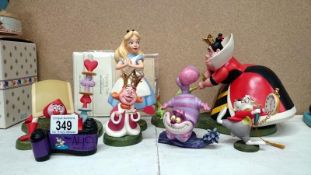 A collectioin of boxed WDCC Alice in Wonderland figures inc. Alice, Queen, King etc.