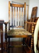 An early 20th century oak carver chair