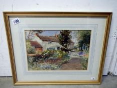 A watercolour of a cottage and garden by Arthur Mills 1908