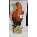 A Beswick Golden Eagle whisky decanter