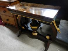 A Georgian mahogany card table with gilded swan necks to base,