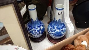 A pair of blue and white vases