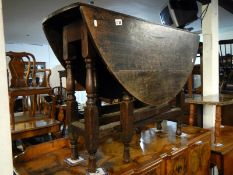 A period oak gate leg table