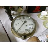 A brass pressure gauge