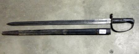 A Victorian sword/ long bayonet with war department arrow on blade also vr 12/82.