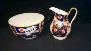 An Imari style sugar bowl and jug