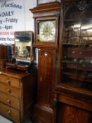 A 19c 30 hour brass faced longcase clock by Mordan,