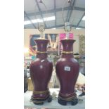 A pair of red brick glazed porcelain table lamps