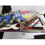 An album of NME Beatles magazines together with a 1964 Beatles quiz book