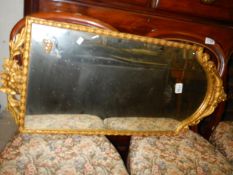 An ormalu gilt framed mirror