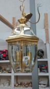 A good quality brass lantern with bevelled glass