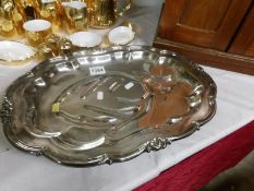 A good quality 'Heirloom' silver plate carving dish with blood drains