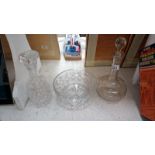 2 glass decanters and a bowl