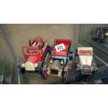 A tinplate modern toys veteran car and 2 Bandai cars,