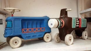 A Sharna plastic ride on HP sauce bottle and a milk float A/F