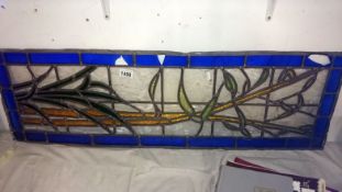 A leaded stained glass window - branch/leaves design a/f