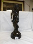 A bronze nude figure