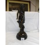 A bronze nude figure