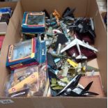 A box of diecast model aircraft etc.