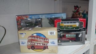 4 Boxed Corgi models inc. bus, trolley bus etc.