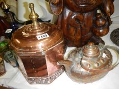A copper kettle and a copper dome