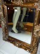 A gilt framed bevel edged mirror