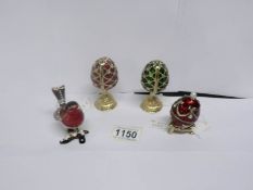 4 collectable 'Treasured Secrets' being 3 Faberge' style eggs and a Robin with pendant