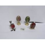 4 collectable 'Treasured Secrets' being 3 Faberge' style eggs and a Robin with pendant