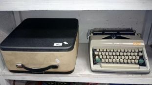 A 1960's Olympia typewriter in case
