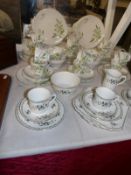 44 pieces of Shelley 'Syringa' pattern tea ware and 12 pieces of Shelley 'Chelsea' pattern tea ware
