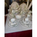 44 pieces of Shelley 'Syringa' pattern tea ware and 12 pieces of Shelley 'Chelsea' pattern tea ware