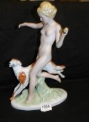 A Royal Dux nude figure with dog