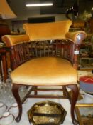 A mahogany stick back bow chair with Queen Anne legs and gold draylon fabric