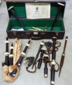 Cased set of bagpipes with items marked R.G.