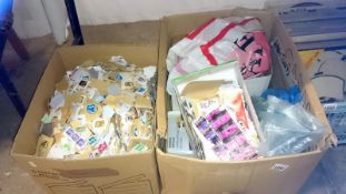 2 boxes of assorted loose stamps